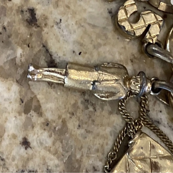 Chanel Extremely Rare 2002 16 Charms Toggled Cold Bracelet - Picture 3 of 12